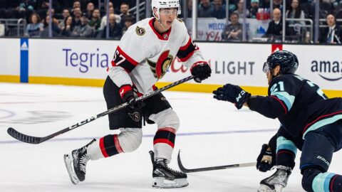 Ottawa Senators forward Shane Pinto skating with the puck during an NHL game