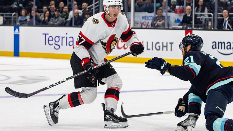 Ottawa Senators forward Shane Pinto skating with the puck during an NHL game