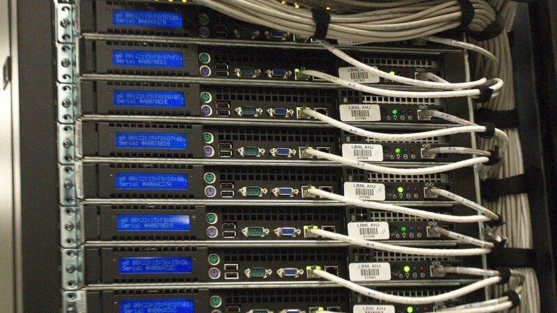 A close-up of a server rack with network cabling in a data center