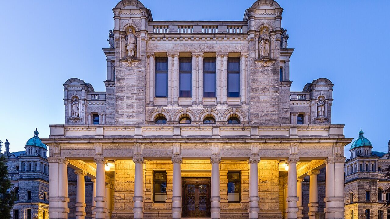 The British Columbia Parliament Buildings in Victoria illuminated at dusk